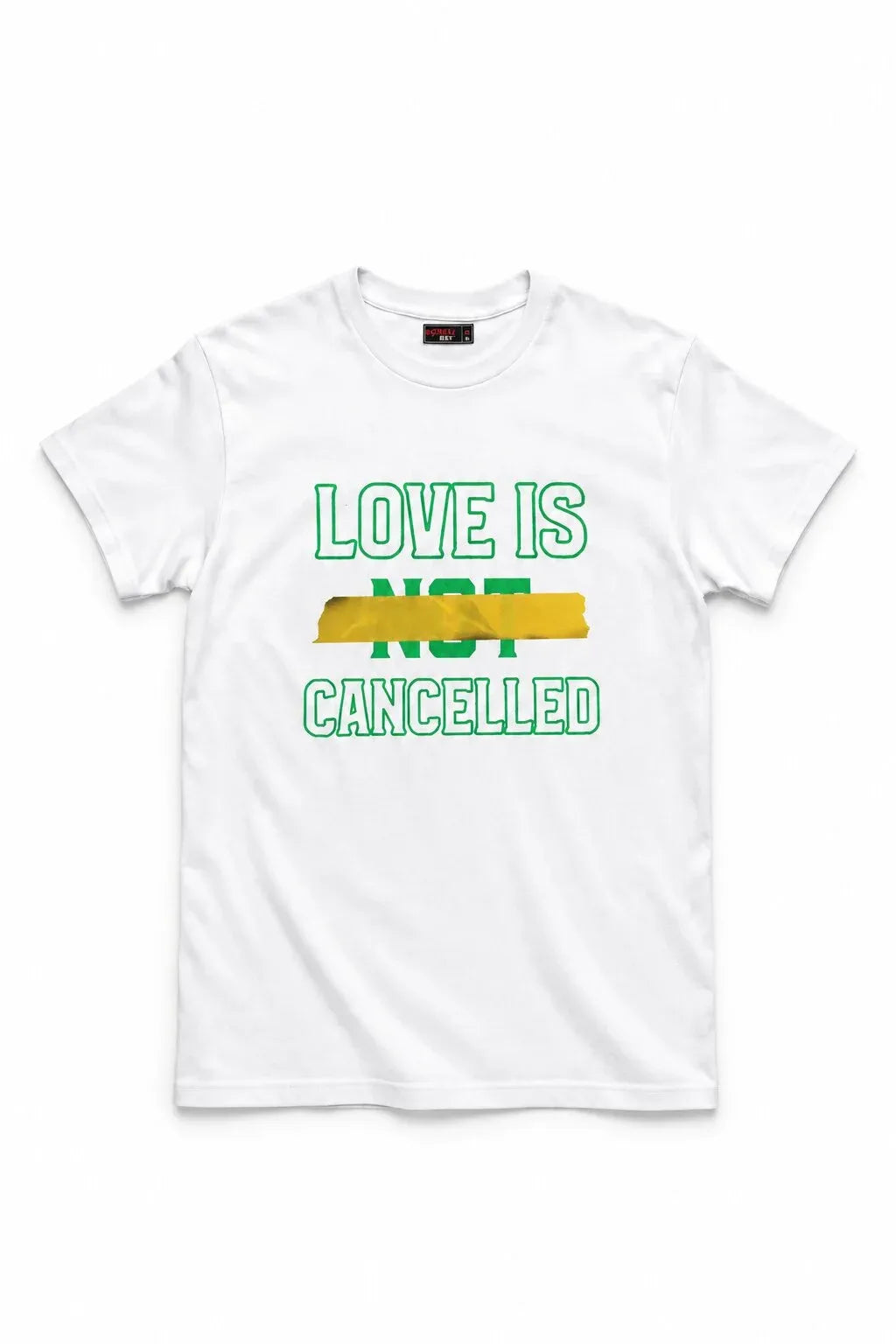 A white short-sleeve crewneck t-shirt with a graphic print on the front reading 'LOVE IS NOT CANCELLED' in green text with a yellow paint-stroke design behind the word 'NOT'.